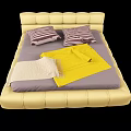 Double Bed With Yellow Bedhead Gray Mattress Striped Pillows And Yellow Beige Blankets