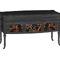 Dark Colored TV Stand With Three Drawers And Artistic Decorative Patterns