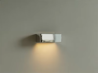 Modern Metallic Chrome Wall Lamp With Warm Light Illuminating Gray Wall 3d model