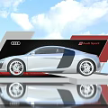 Silver Audi R8 Spyder on Display Platform with Red Black Design and Blue Sky Clouds