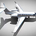 Small White Passenger Jet With Blue Accents And Open Cabin Door