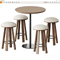 Round Wooden Bar Counter with Metal Base and Four Padded Wooden Stools