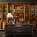 Ornate Carved Wooden Desk With Large Bookcase Books Decorations And Table Lamp
