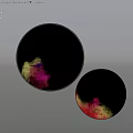 Two Round Decorative Mirrors With Colorful Abstract Patterns Hanging On White Wall