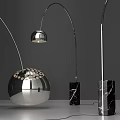 Three Modern Floor Lamps With Silver Metal Spherical Perforated Shade And Black Marble Base