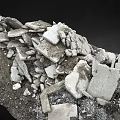 Pile Of Ancient Stone Fragments And Broken Artifacts From Archaeological Site