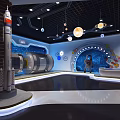 Space Themed Exhibition Interior With Rocket Model Astronaut Figure And Planet Decorations