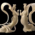 Decorative Ornament Set With Two White Fairy Like Figurines And Flowing Ribbons