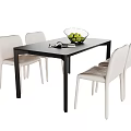 Modern Dining Table Set With Black Table Four White Chairs And Green Fruit Bowl 3d model