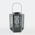 Decorative Metal Candle Lantern with Intricate Lattice Design and Burning Candle