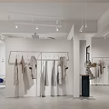 Modern Clothing Store Interior With Hanging Apparel And Minimalist Display Racks