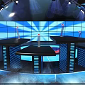 Modern Stage Setup With Blue Lighting Large LED Screen And Black Platforms