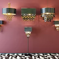 Modern Chandeliers With Metallic Rings Hanging On Pink Wall Over Black White Geometric Floor Tiles