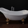 Freestanding White Bathtub with Gold Brass Legs on Dark Wooden Floor