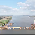 Massive Cable Stayed Bridge Under Construction With Tower Crane Spanning The Wide Calm River