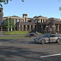 Luxury Hotel Building Exterior With Classical Tower Lawn Trees Driveway And Luxury Car
