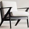 Modern Accent Chair With White Cushion And Black Wooden Frame Design