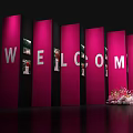 Stylish Photo Spot with Pink Flowers Lighted Archway ME Lettering on Wall and Decorative Lights