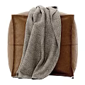 Elegant Brown Upholstered Ottoman With Cozy Gray Blanket For Living Room Decor