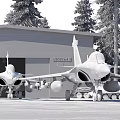 Military Fighter Jets Parked In Front Of White Hangar With French Flag And Pine Trees