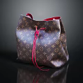 Classic Monogram Pattern Leather Drawstring Bag With Red String Closure And Elegant Design