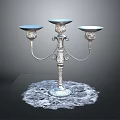 Elegant Silver Candelabra With Three Candle Holders On Lace Doily