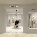 Modern Clothing Store Interior With White Mannequins Chandelier and Green Plant