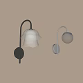Modern Black And Silver Wall Lamps With White Shades On Light Wall