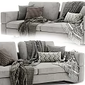 Modern Gray Two-Seater Sofa With Checkered Chevron Pillows And Knitted Blankets 3d model