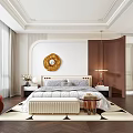 Elegant Bedroom Interior With Large Bed Round Gold Wall Decor Side Tables Armchair And Area Rug