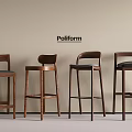 Four Pollform Modern Wooden Bar Stools with Backrest and Dark Seat Against Light Wall Background
