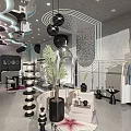 Elegant Modern Clothing Store Interior With Neon Lights Mirrors Display Racks Plants And Decorative Items