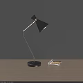Modern Black Table Lamp With Sleek Design On Wooden Table And Book