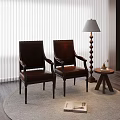 Brown Leather Armchairs With Floor Lamp Small Round Table And Rug On Wooden Floor