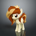 Brown And Beige Mane Pony Toy With Golden Crown Black Eyes And Gray Background