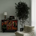 Colorful Patterned Entryway Side Cabinet With Tall Plant And Lamp Near Sofa