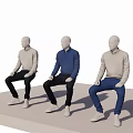Sitting Mannequins Wearing Blue Beige Sweaters Black Blue Pants And White Sneakers