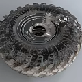 Off Road Tire Featuring Worn Tread And New Wheel Hub Mechanical Parts