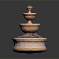 Three Tiered Decorative Fountain With Orange And White Carved Stone Design
