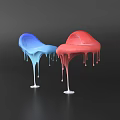 Abstract Modern Sculptures With Blue Red Melting Shapes And Dripping Details On White Base