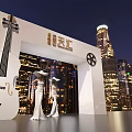 Tianhui Event Gate With Cello Film Reel And Models In City Night View