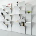 Modern White Geometric Bookshelf With Multi Layer Shelves Decorative Books Sculpture Green Plant And Frame