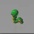 Green Caterpillar Toy Yellow Green Stripes Closed Eyes Pink Cheeks on Black Surface with Reflection
