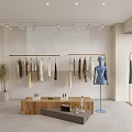 Modern Clothing Store Interior With Hanging Clothes Mannequin Display Table And Spotlights