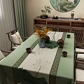 Traditional Dining Table Set With Green Lotus Pattern Tablecloth Golden Trim And Wooden Chairs