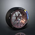 Racing Tire Featuring Black Rubber Copper Colored Alloy Wheel And Stylish Spoke Design