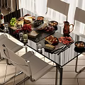 Modern Glass Top Dining Table Set With White Chairs And Assorted Food