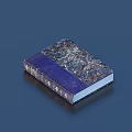 Hardcover Book With Dark Blue Cover Golden Decorations And Intricate Patterns