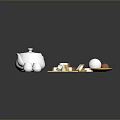 Household Items Collection Featuring White Teapot Cups Tea Bags And Eggs On Plate