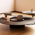 Modern Black Round Coffee Table with Books Candle Cylindrical Container and Small Side Table